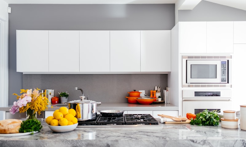 An open kitchen with a stone island